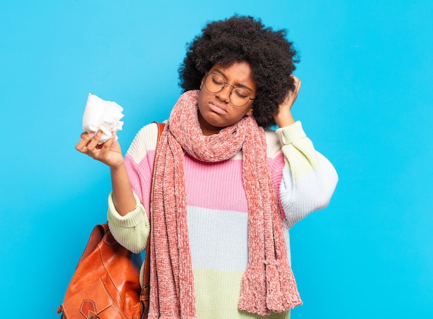 Young pretty afro woman flu or illness concept