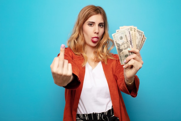 Young pretty blonde woman with banknotes