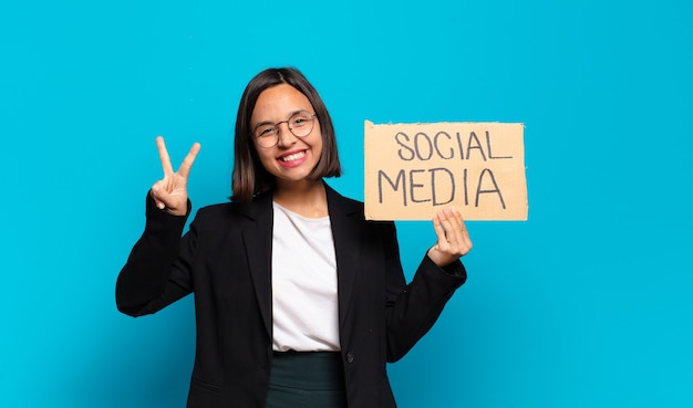 Young pretty businesswoman social media concept