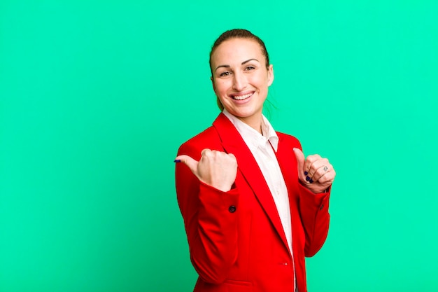 Young pretty businesswoman wearing red blazer