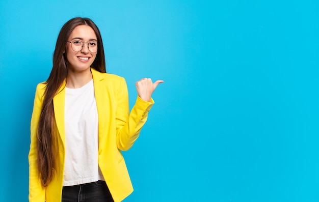 Young pretty businesswoman with a copy space