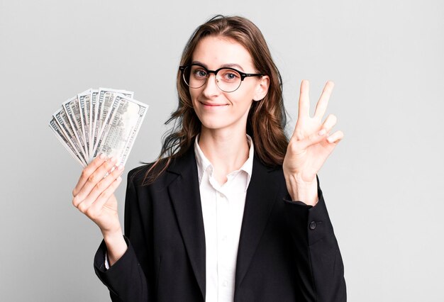 Photo young pretty businesswoman with dollar banknotes