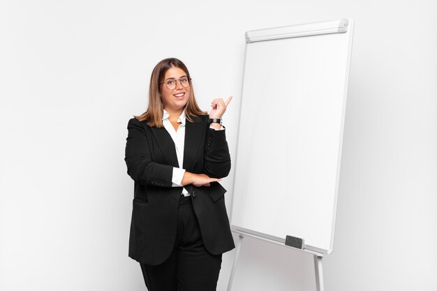 young pretty businesswoman with white board