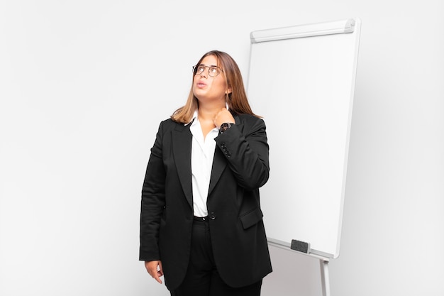 young pretty businesswoman with a white board