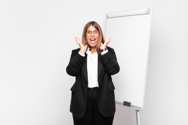 young pretty businesswoman with a white board