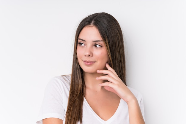 Young pretty caucasian woman face closeup isolated