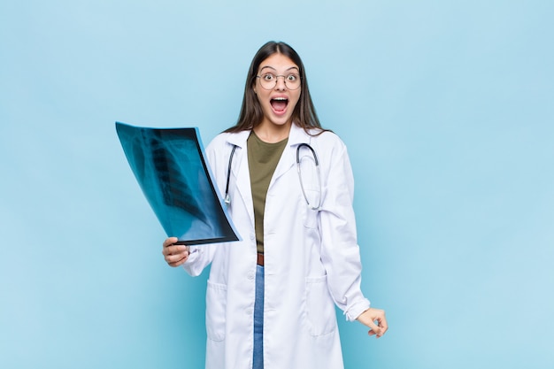 young pretty physician with a bone scan