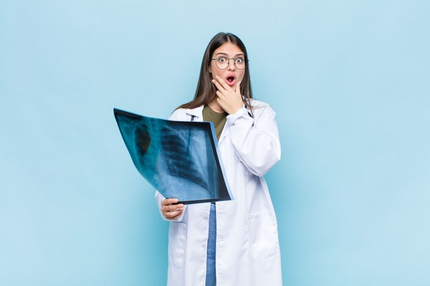 young pretty physician with a bone scan