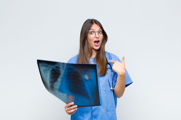 young pretty physician with a bone scan