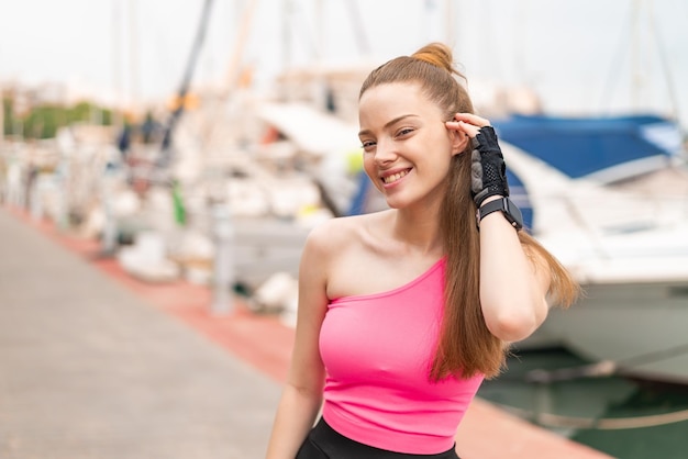 Young pretty sport girl at outdoors Portrait