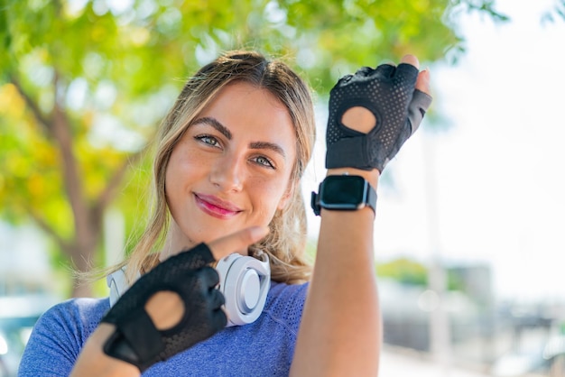 Young pretty sport woman with sport watch