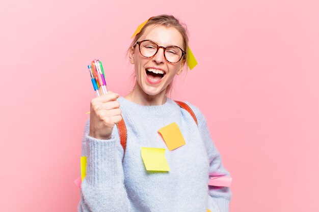 Young pretty student woman happy expression