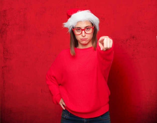 若いきれいな女性クリスマスのコンセプトです。編集可能な背景