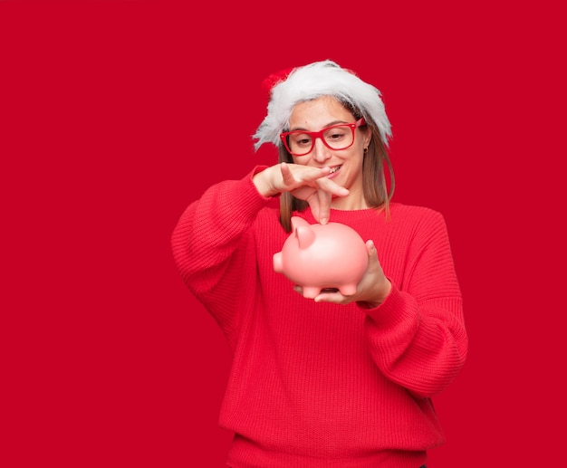 Foto giovane concetto di natale della donna graziosa. sfondo modificabile