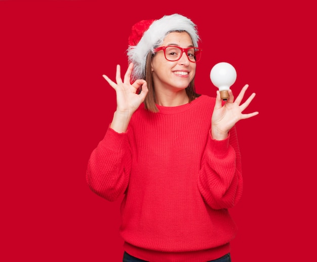 若いきれいな女性クリスマスのコンセプトです。編集可能な背景