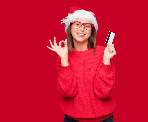 Foto giovane concetto di natale della donna graziosa. sfondo modificabile