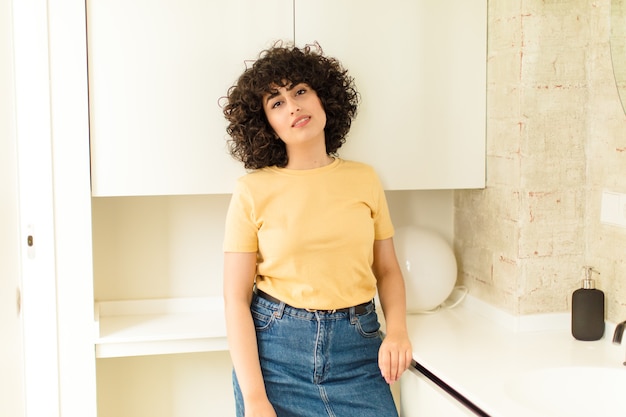 Young pretty woman in a home bathroom