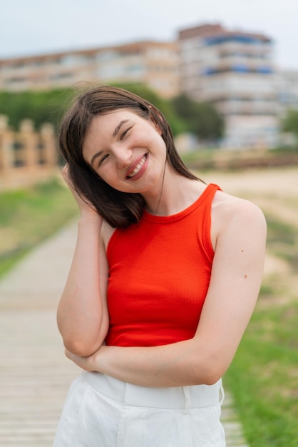 Young pretty woman at outdoors Portrait