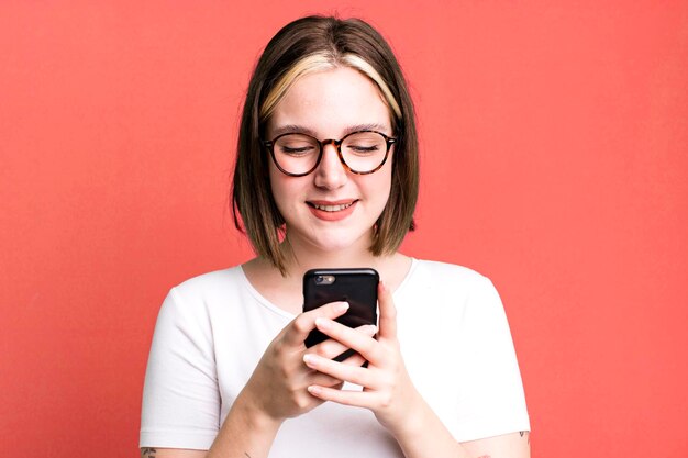 Young pretty woman using a smartphone