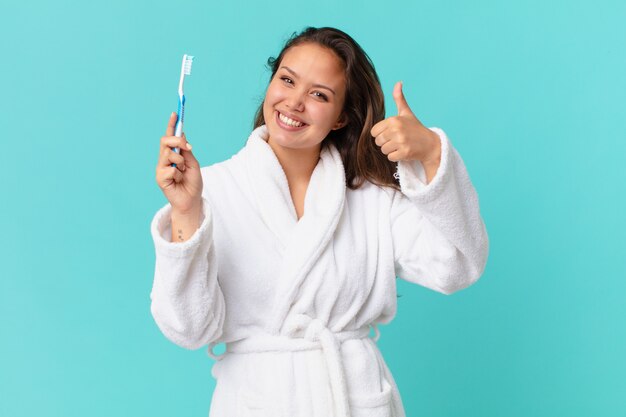 Young pretty woman wearing bathrobe