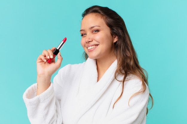 Young pretty woman wearing bathrobe