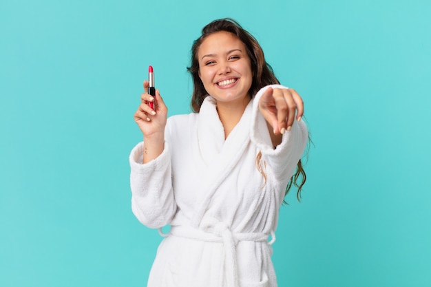 Young pretty woman wearing bathrobe