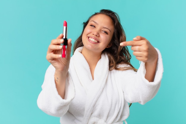 Young pretty woman wearing bathrobe