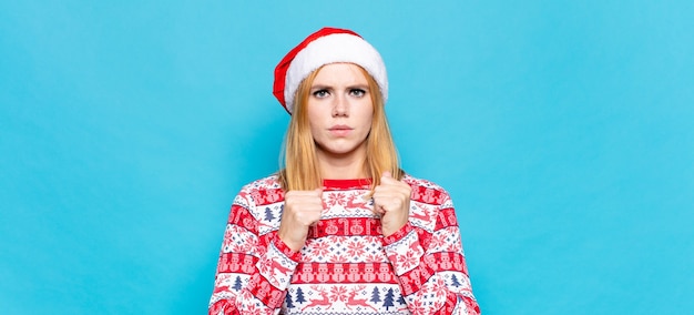 Young pretty woman wearing christmas clothes