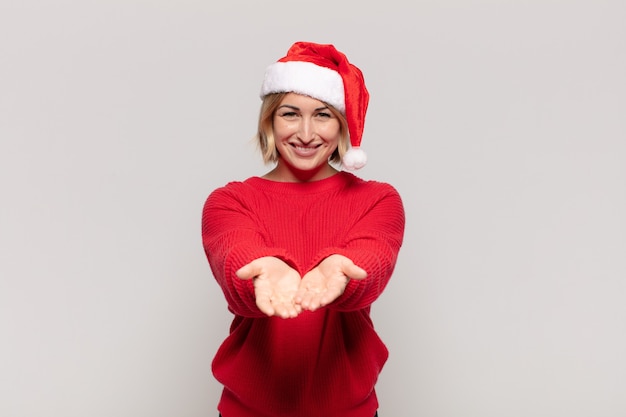 Young pretty woman wearing Christmas clothes