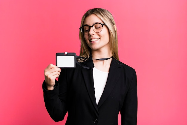 Young pretty woman with an accreditation id pass card