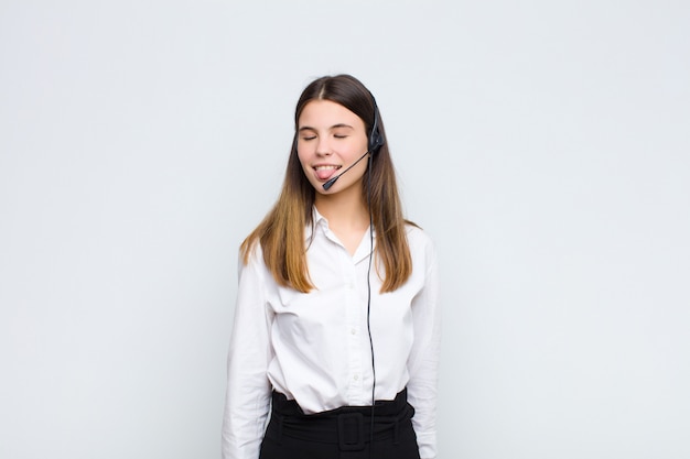 Young pretty woman with cheerful wearing headphones and microphone