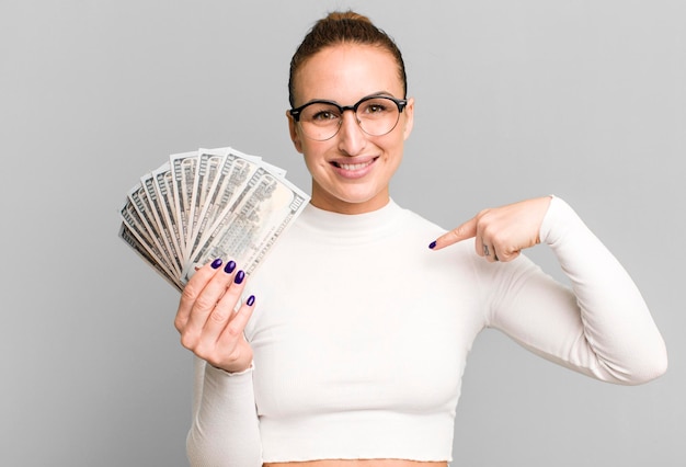 Young pretty woman with dollar banknotes