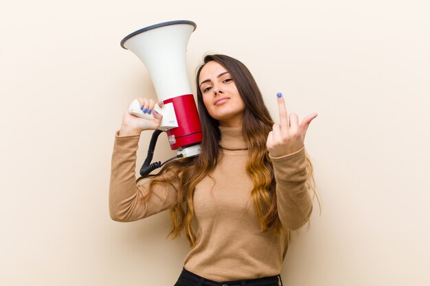 Young pretty woman with a megaphone