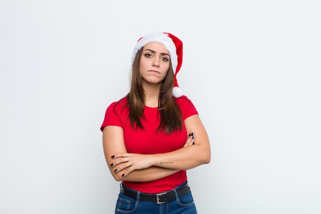 Young pretty woman with santa hat. Christmas concept. 