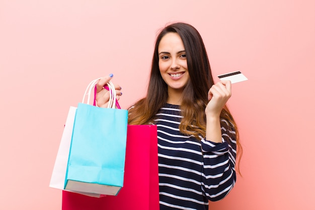 Young pretty woman with shopping bags