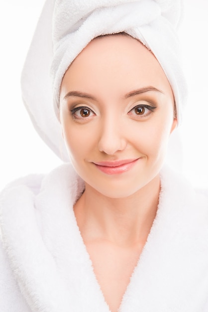 Young pretty woman with towel on her head