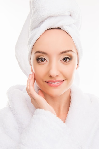 Young pretty woman with towel on her head