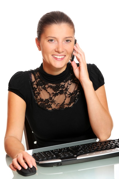 a young pretty woman working in the office