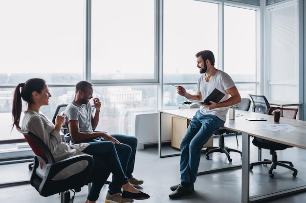 Young professional team discussing business plan in the office