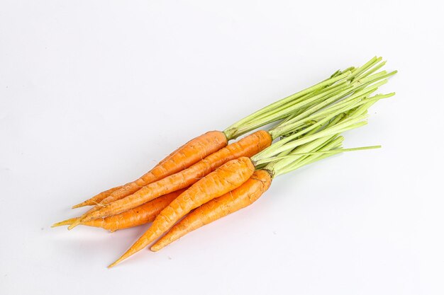 Photo young raw carrot heap isolated