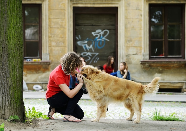 Young real people on the street with dog