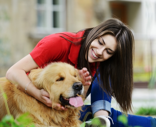 Young real people on the street with dog