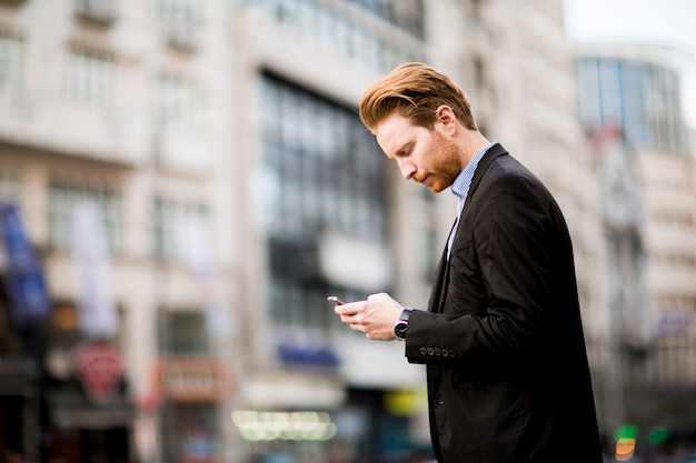 Young red hair man outdoors