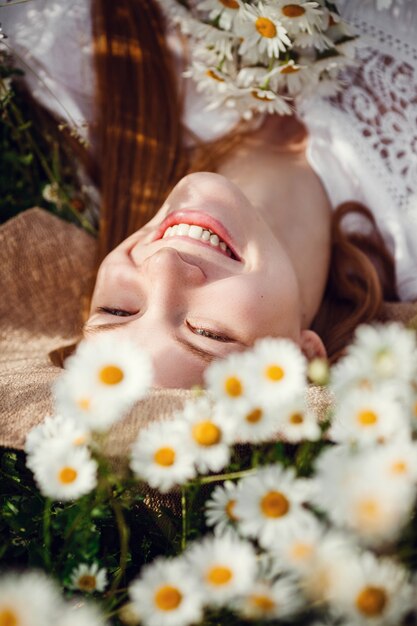 Young redhaired traveler in fairytale beautiful scenery