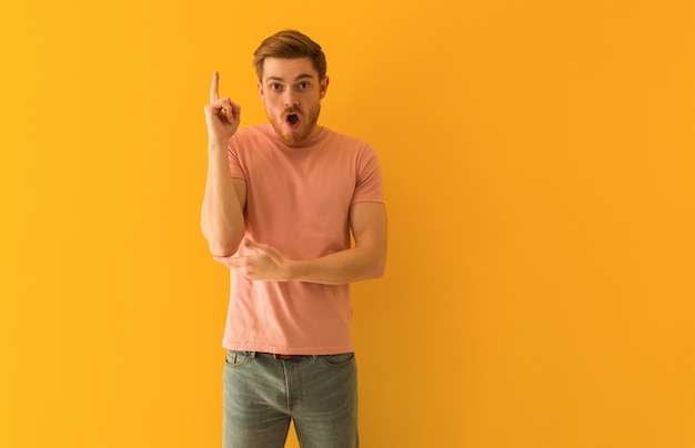 Young redhead man having a great idea, concept of creativity