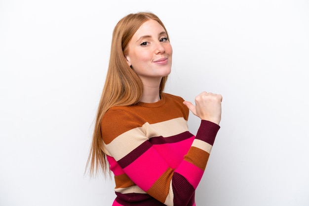 Young redhead woman isolated on white background proud and selfsatisfied