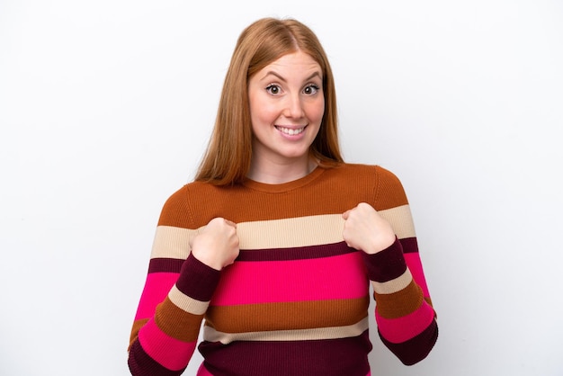 Young redhead woman isolated on white background with surprise facial expression