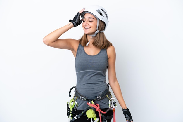 Young rockclimber woman isolated on white background has realized something and intending the solution