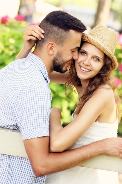 a young romantic couple in the park