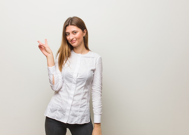 Young russian girl doing a gesture of victory